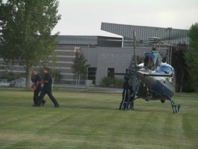 Carson City paramedics met Care Flight in the lawn area of Carson High School tonight.