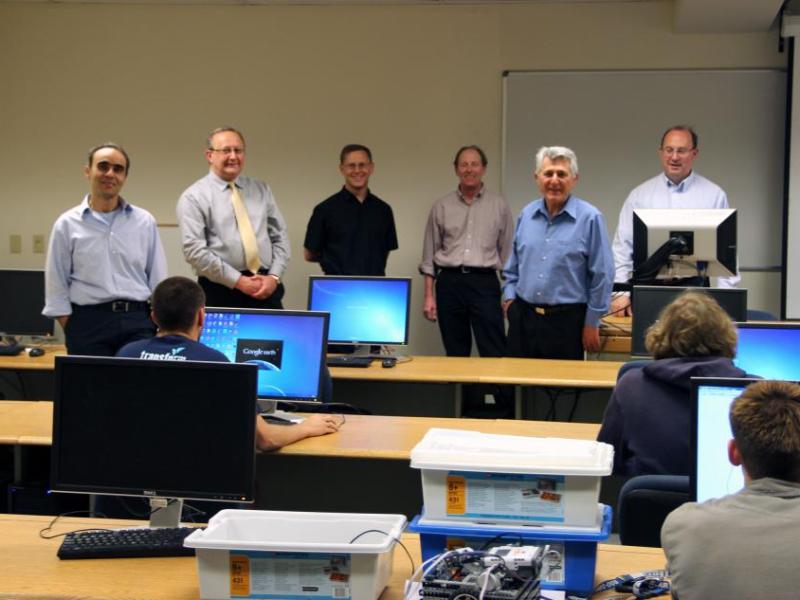 CSE department faculty members gather in a University of Nevada, Reno computer lab. Photo by Mike Wolterbeek