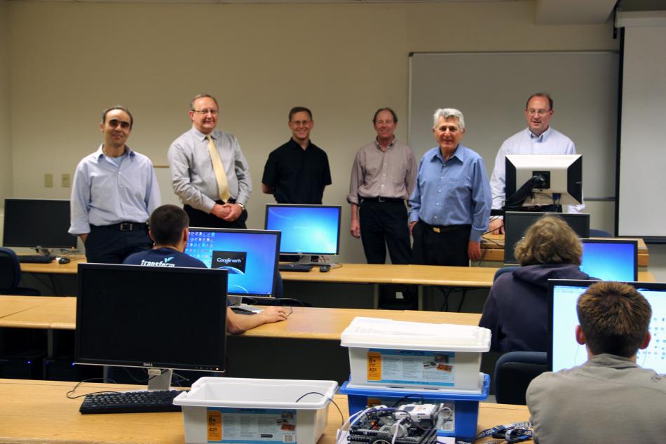 CSE department faculty members gather in a University of Nevada, Reno computer lab. Photo by Mike Wolterbeek