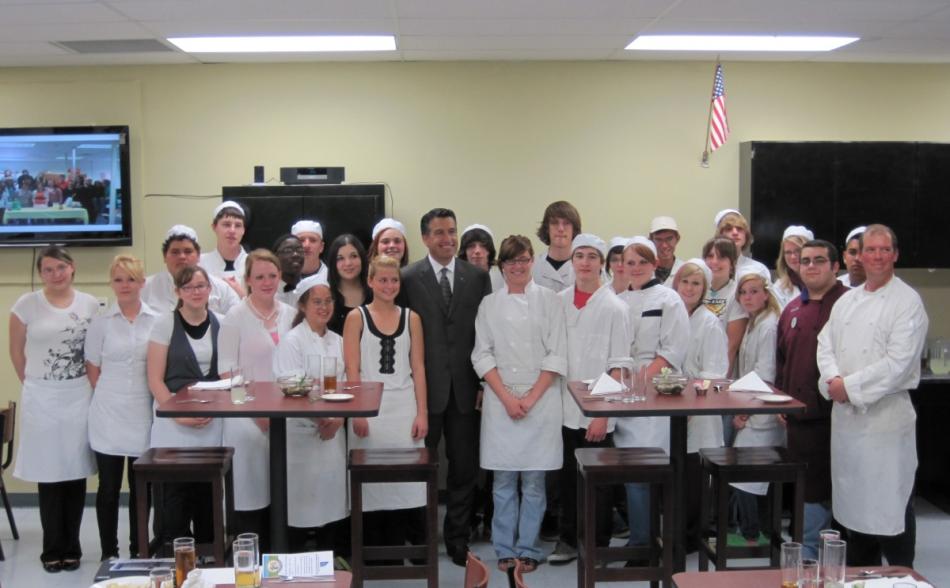Governor Sandoval poses with David Palmer's culinary arts class during a luncheon at Dayton High School.