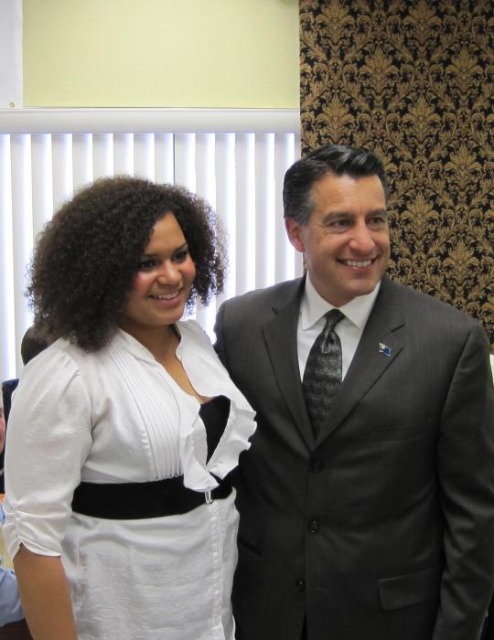 Gov. Sandoval poses with Dayton High student body president Haley Johnson.