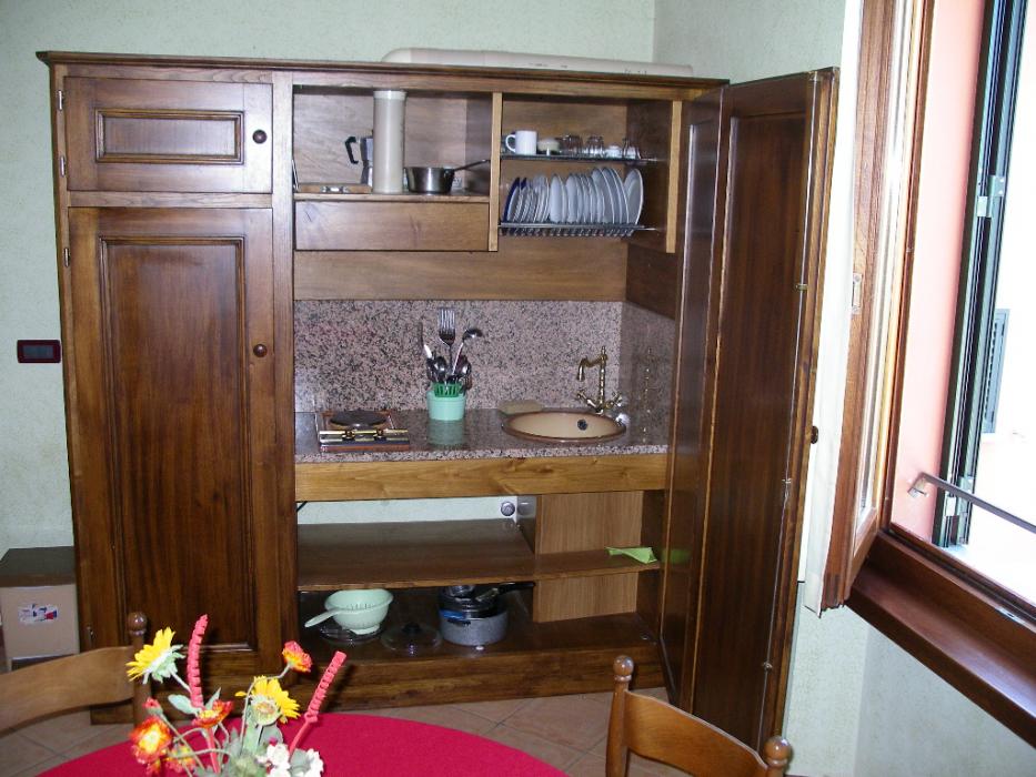 This small cupboard contains the entire kitchen at a rented villa in Ponti Buggianese.  Photo by Don Quilici