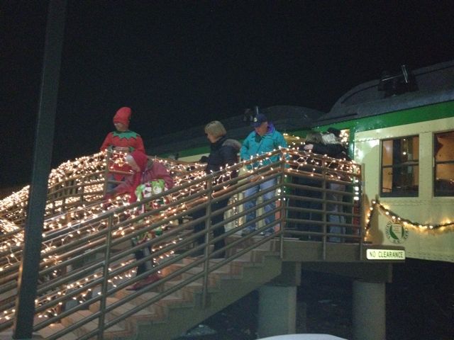 Passengers disembark from the Polar Express