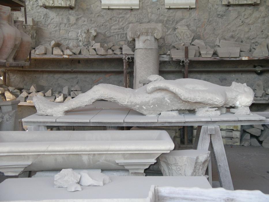 The cast of a man in Pompeii, who was buried by ash from the eruption of Mt. Vesuvius in 79 A.D.  Photo by Don Quilici