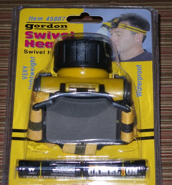 A swivel headlamp that operates on two AA batteries. Handy for outdoors at night. Photo by Elaine Quilici