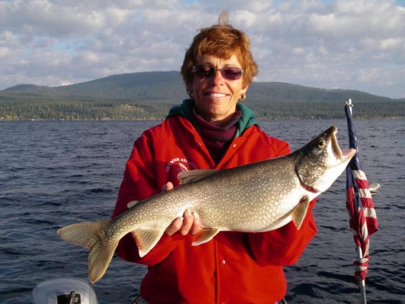 Elaine Quilici holds her 8.5 pound Mackinaw (Lake) Trout caught trolling the west shore of Lake Tahoe. Photo by Don Quilici