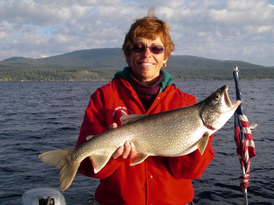 Elaine Quilici holds her 8.5 pound Mackinaw (Lake) Trout caught trolling the west shore of Lake Tahoe. Photo by Don Quilici