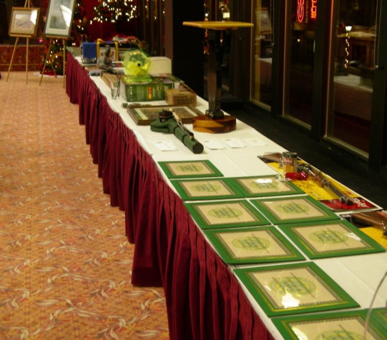 Plaques and auction items that were awarded at the Ormsby Sportsmen’s Association's annual banquet. Photo by Don Quilici