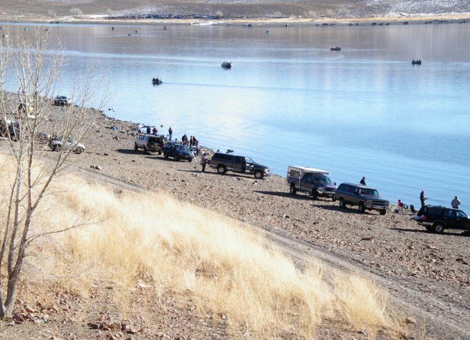 Some of the many shore fishermen on that Opening Day on the north shore of Topaz Lake. Photo by Elaine Quilici