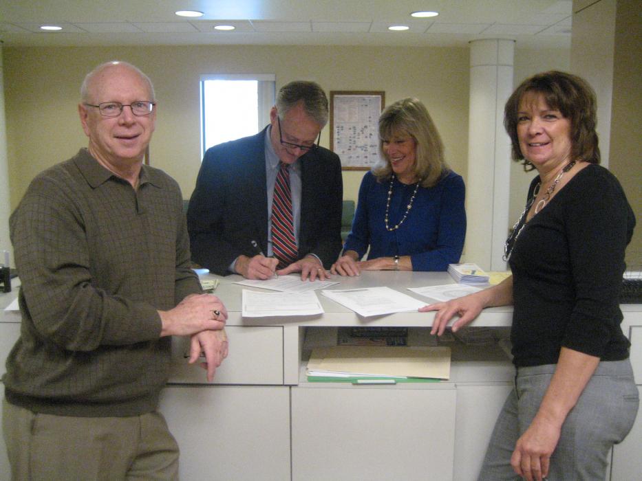 John Tatro, center, with wife Kathy, files for reelection