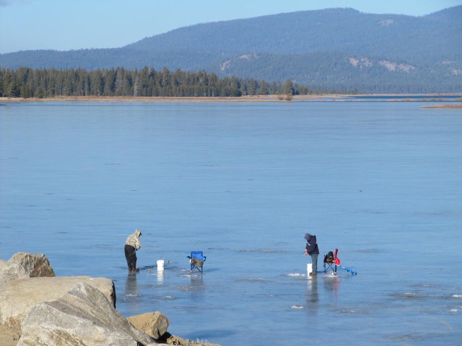 Two ice fishermen near the dam at Davis Lake, Calif., on Sunday, Jan. 15. Photo by Elaine Quilici 