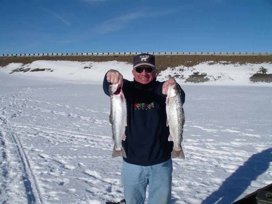 Don Quilici of Carson City with two rainbow trout caught through the ice at Wildhorse Reservoir.
