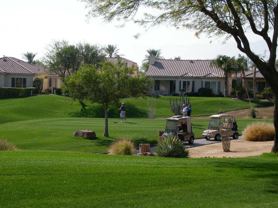 Watching a threesome tee off at the 16th tee at Heritage Palms Golf Course in Indio, Calif.