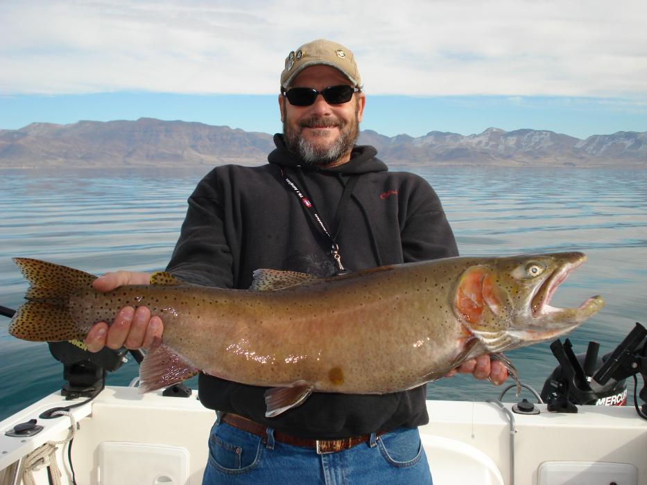 Chris Grellman holds a 12lb, 14-ounce, 31-inch Lahontan Cutthroat Trout caught at Pyramid Lake in 2009. Photo by  Jeri Grellman