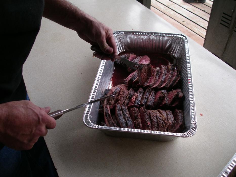 A container of sliced tri-tip, fresh off the barbecue.  Photo by Don Quilici