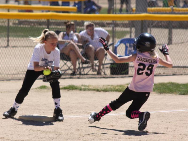 Pink Diamonds Bryar Fancher slides safely into 3rd under the tag of the Royal Ladies Lexi Phillipi.