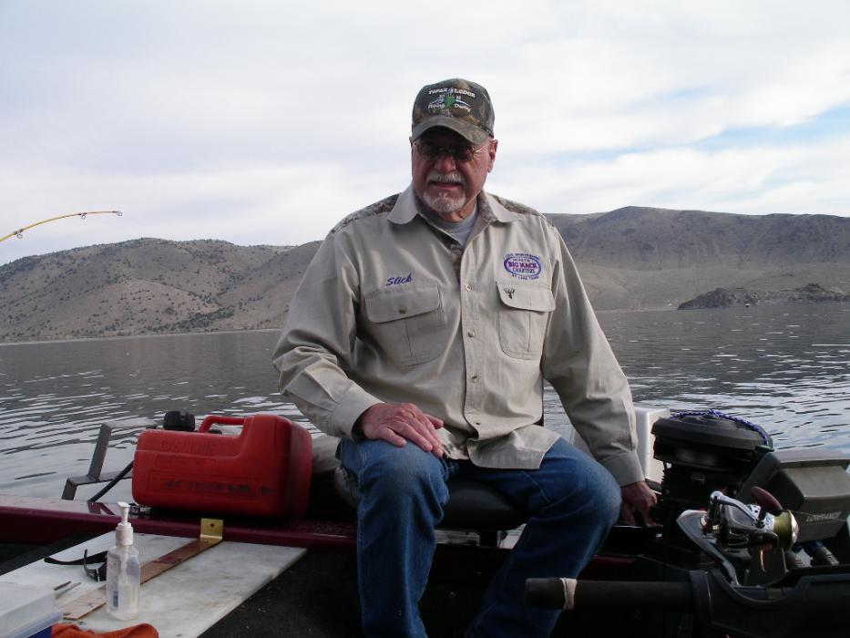 Bob “Slick” McCulloch of Carson City steering the trolling motor while fishing at Topaz Lake. Photo by Don Quilici