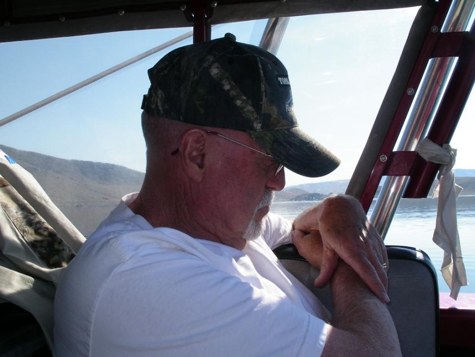 Bob McCulloch enjoying some shuteye rather than fishing.  Photo by Don Quilici