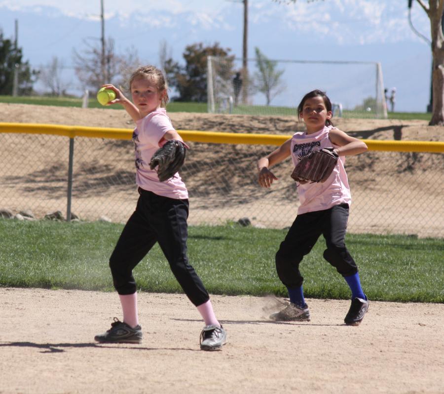 Hailee Bauman fielding with backup by Alexis Fox