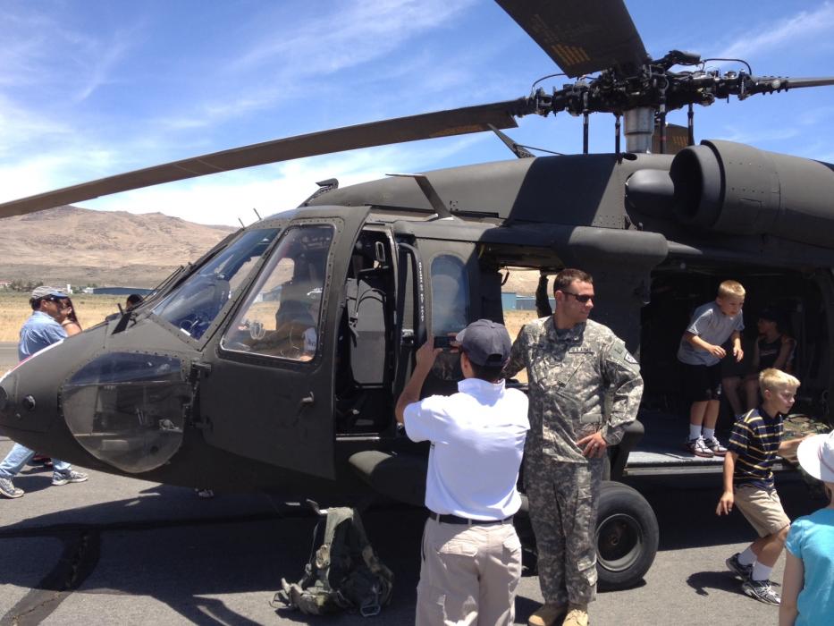 Visitors explore a Blackhawk helicopter