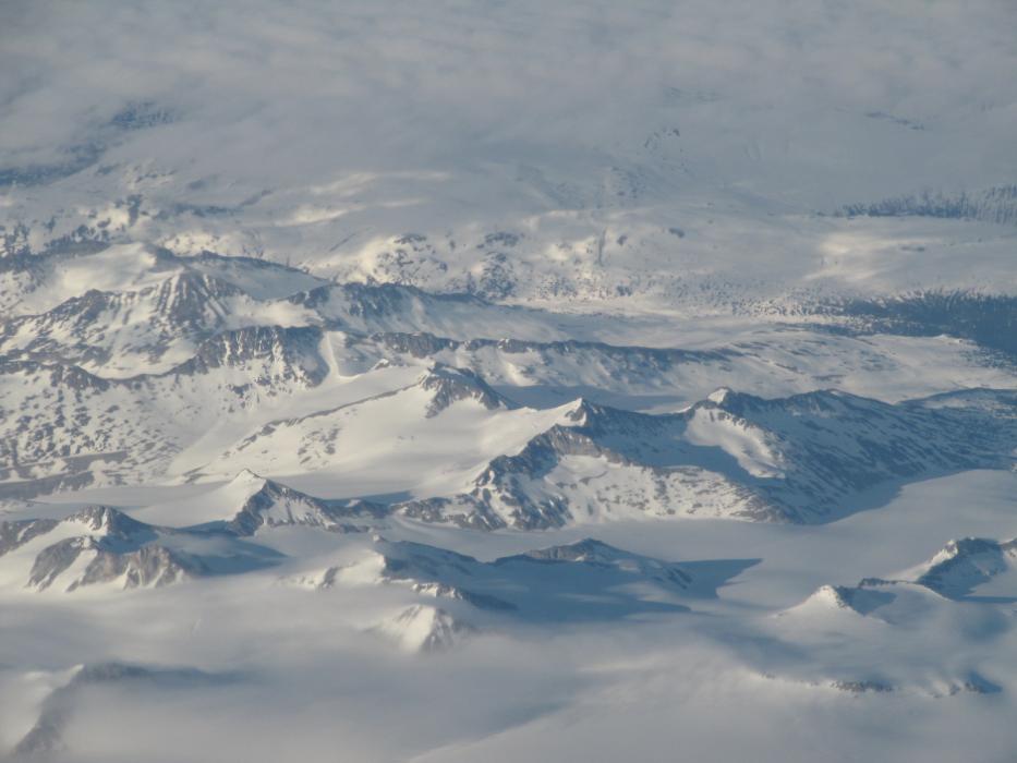 As seen from a jet, it was still winter in the mountains between Vancouver, B.C. and Whitehorse, Yukon.  Photo by Don Quilici