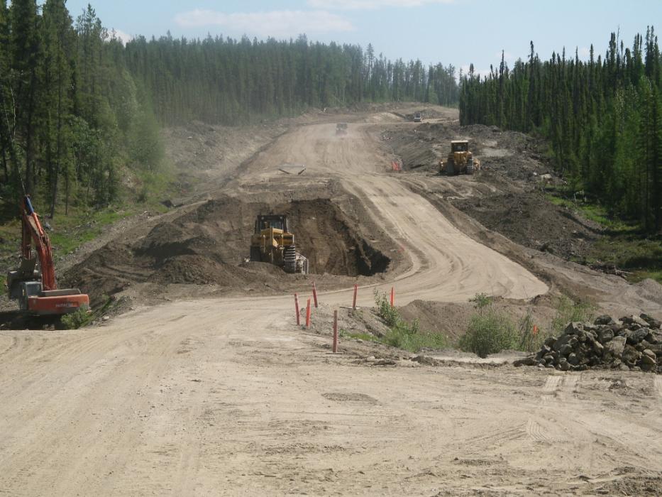Road crews working on a bad washout on the Robert Campbell Highway near Watson Lake. Photo by Elaine Quilici