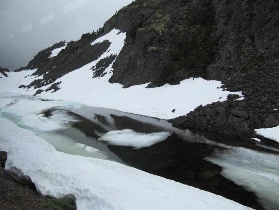 A partially frozen lake near the top of White Pass Summit.  Photo by Don Quilici