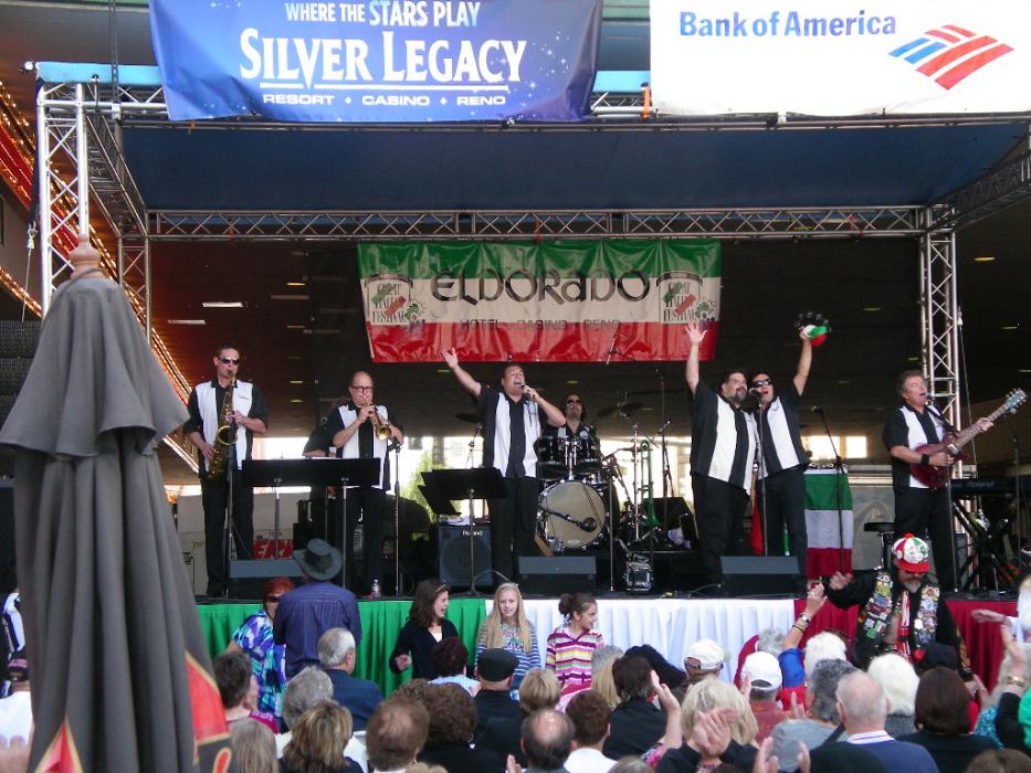 A band playing to a jam-packed audience.  Photo by Elaine Quilici