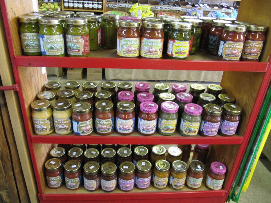 All kinds of fruit and vegetable bottled products.  Photo by Elaine Quilici