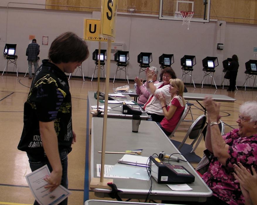 R.J. Thompson, 20, gets a round of applause for being a first time voter. 