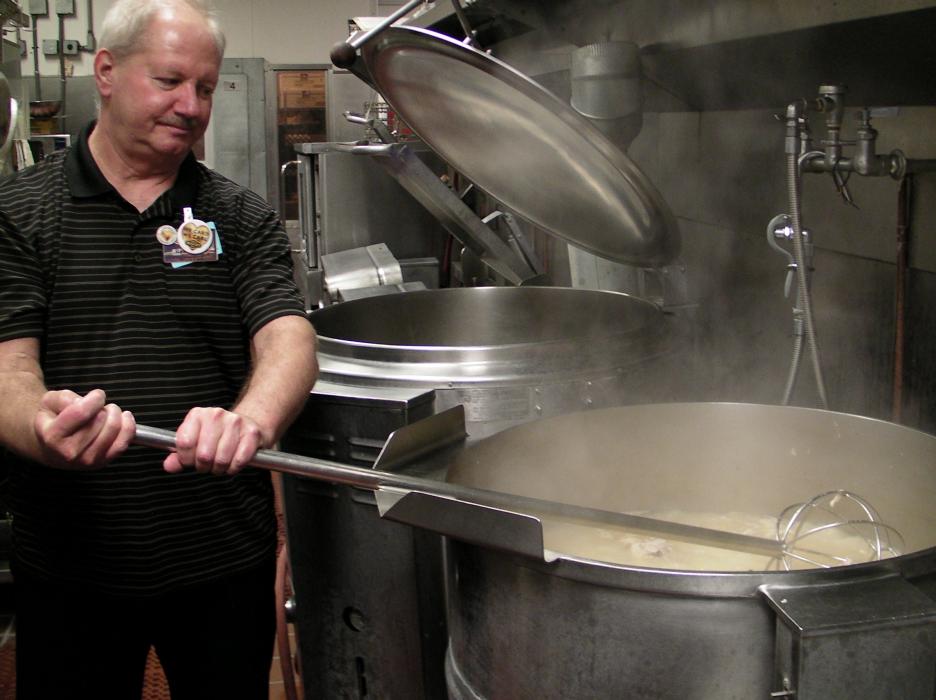 Food and Beverage Director Ron Hogarth stirs the stock for the gravy.