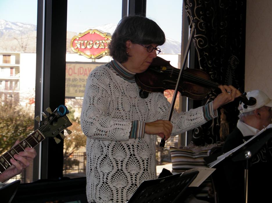Sue Jesch plays the violin. She runs the Strings in Schools program.