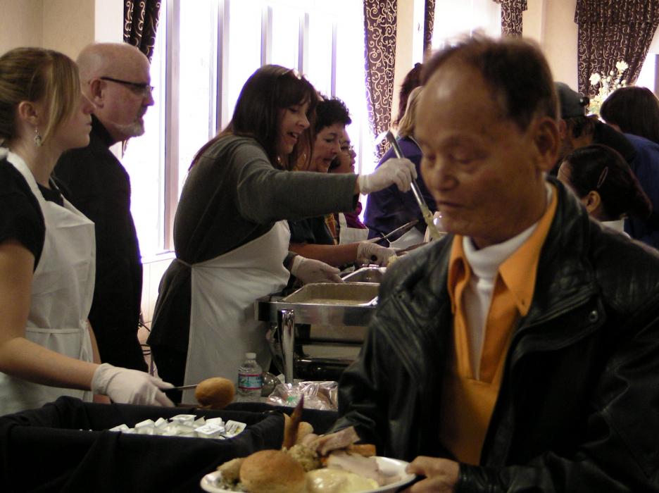 Young Suh of Carson City gets a plate full of food.