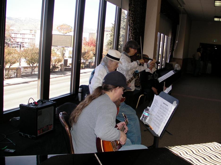 The Hot Club Gang perform during the community dinner.