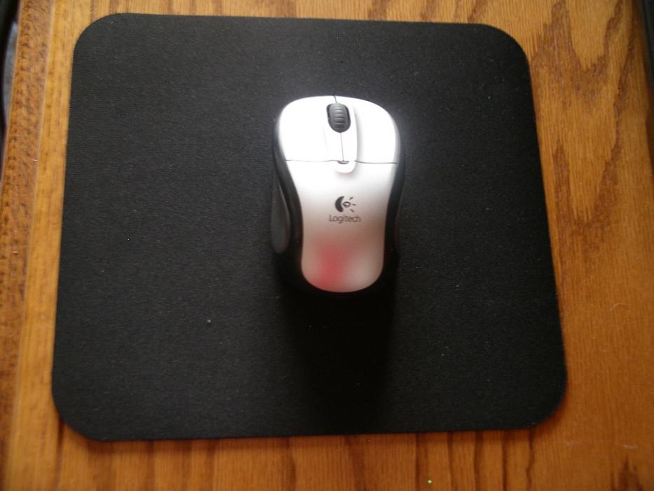 A wireless mouse and mouse pad.  Photo by Elaine Quilici