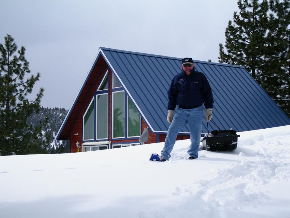 Don Quilici of Carson City snowshoeing past a neighbor's cabin on his way to the nearby Quilici Cabin.  Photo by Elaine Quilici