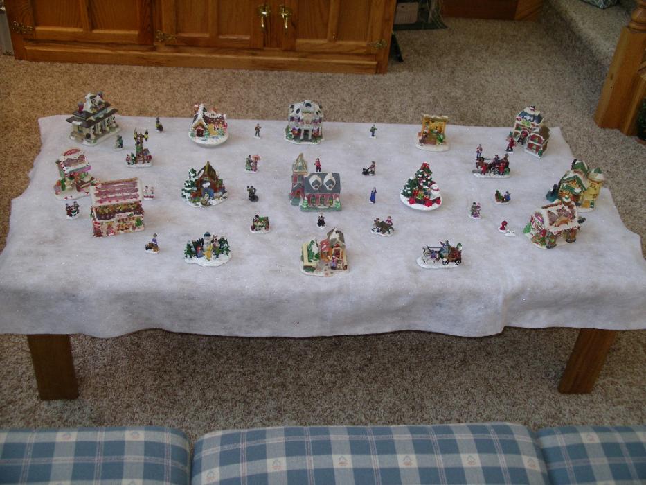 A Christmas village scene on the coffee table. Photo by Elaine Quilici