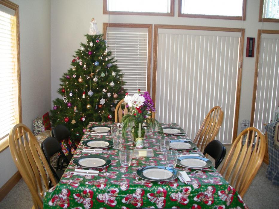 The table is set for Christmas Eve dinner. Photo by Elaine Quilici