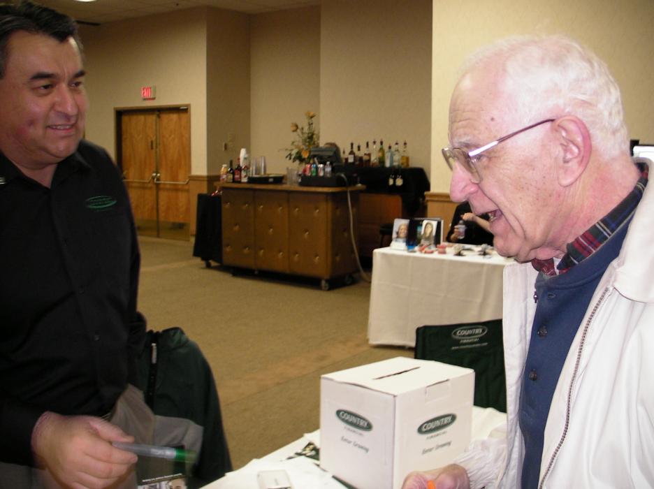 Steve Ybarra of Country Financial speaks with Robert Parvin of Carson City.