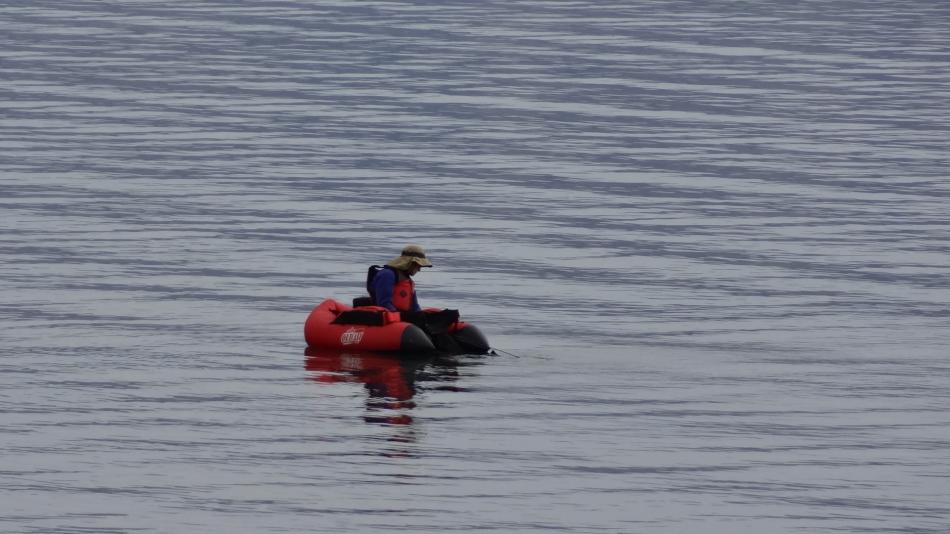A float tuber taking a break from fishing at Warrior Point.  Photo by Elaine Quilici