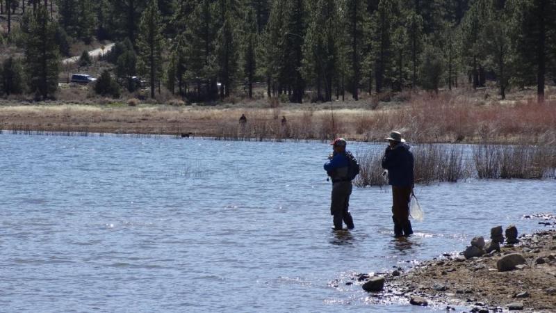 A fly guy who caught and released a 15-inch rainbow trout on a yellow-colored artificial fly.  Photo by Elaine Quilici