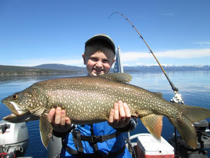 This 8-year-old caught a 13-pound Mackinaw at Lake Tahoe recently. Photo courtesy of Gene St. Denis