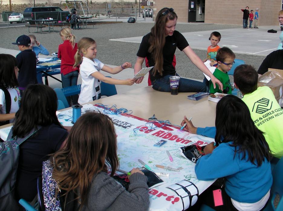 Carson City Sheriff's Office dispatcher Jenn Davis engages students.