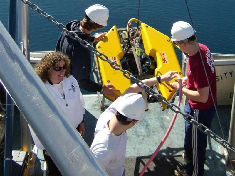 Dr. Kortemeier works with students from Santa Clara University to deploy a remote operated vehicle into Lake Tahoe.