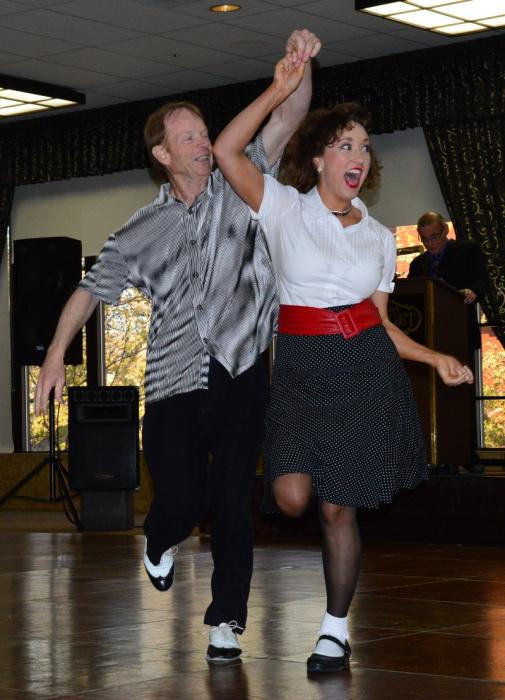 Earl Case and Tonya Champa dance the jitterbug.