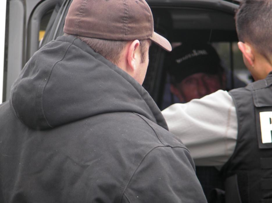 Authorities interview suspect Charles Self.