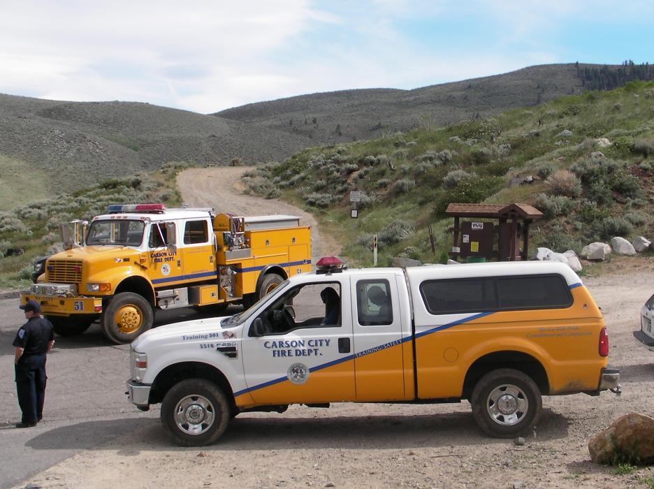 The passengers, who were uninjured, sign statements inside a rescue vehicle.