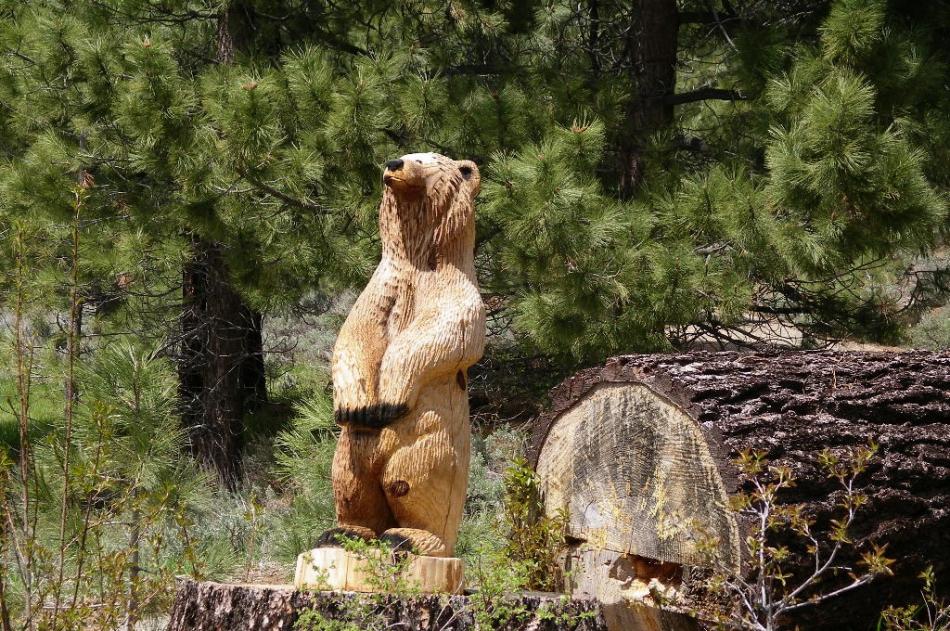 A bear carving, if you know where to look on Grizzly Road.  Photo by Elaine Quilici