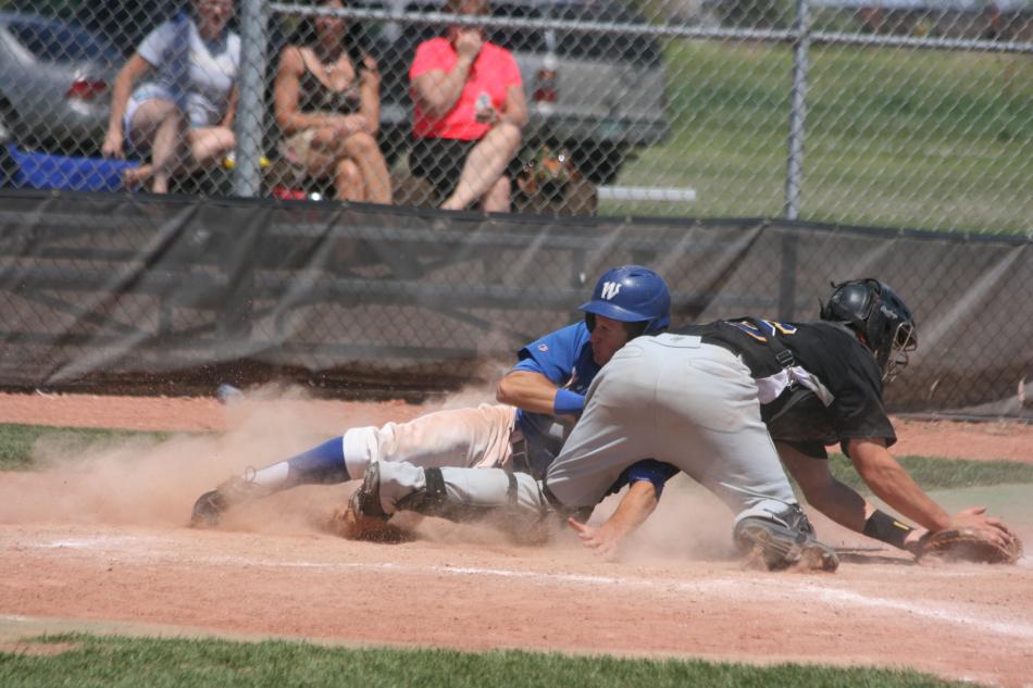 Matt Becker slides home.