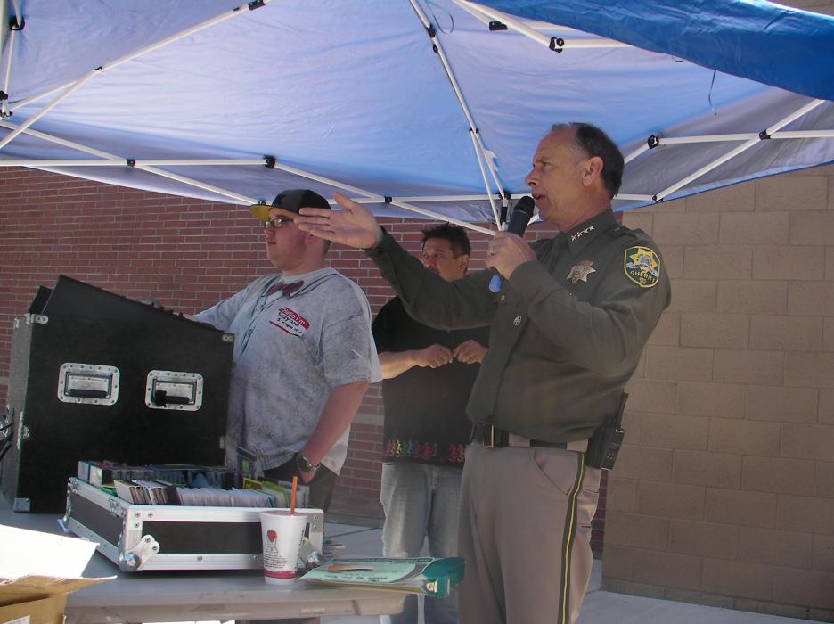 Kyle Lane, Dan Kimm of Rockit Productions and Sheriff Ken Furlong.